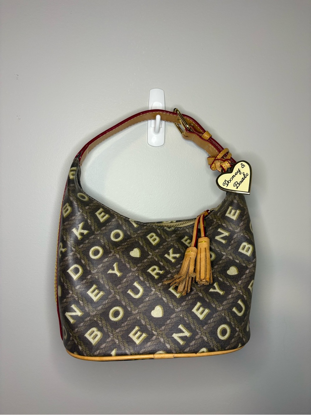 Dooney & Bourke Signature Bucket Shoulder Bag Coated Canvas. With Heart Charm